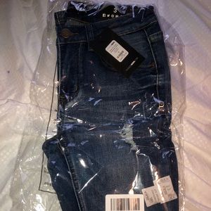 Fashion Nova dark wash ripped jeans